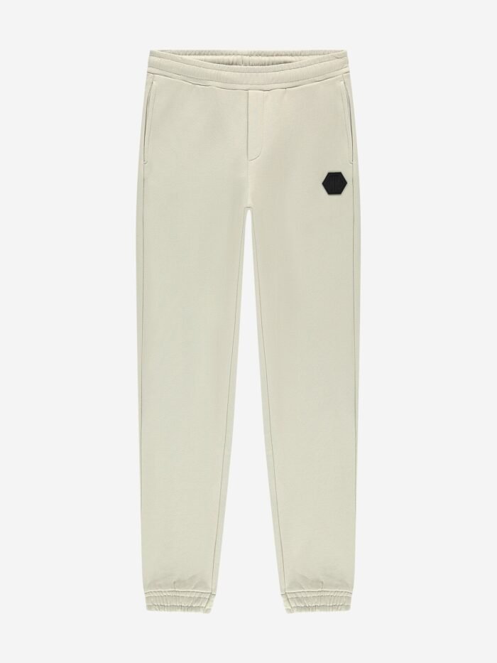 Nik&Nik Jongens sweat broek - Icon - Beige Comfort en stijl in één. Deze beige Nik&Nik sweat broek met elastische tailleband en zwart logo detail is een veelzijdig kledingstuk