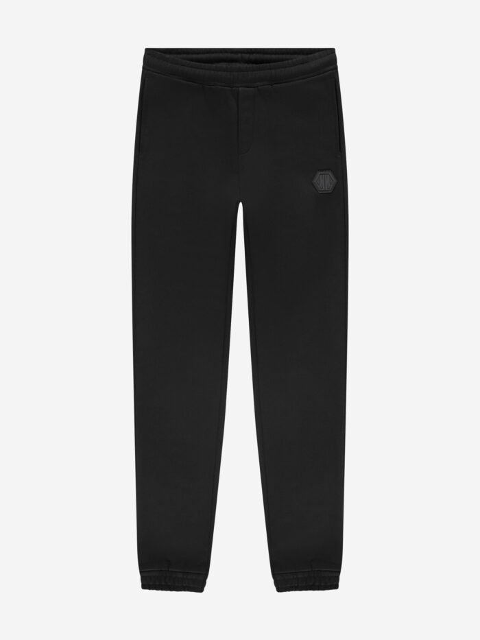 Nik&Nik Jongens sweat broek - Icon - Zwart Deze zwarte sweat broek van Nik&Nik met elastische tailleband en logo detail is een stijlvolle en comfortabele keuze. Combineer het met de bijpassende hoodie voor een coole en complete look.Materiaal
